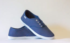 Blue canvas shoes that are great vegan shoes for traveling