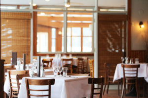 An empty vegan restaurant ready to accept guests